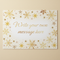 Gold Christmas poster on cream wall