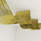 Gold fringe curtain with ceiling and background
