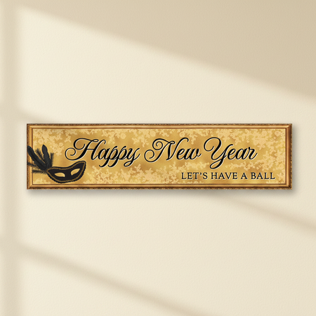 Gold masquerade Happy New Year banner against a cream wall
