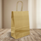 Gold Party Bag on Wood Table