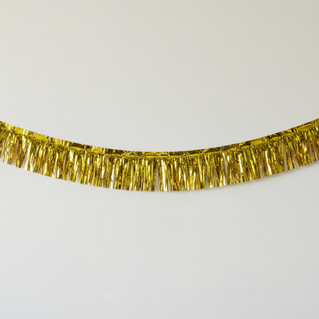 Gold Tassel Garland Hung with Curve and Light Shadow