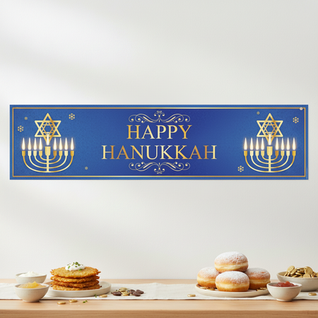 Hanukkah banner above a food table