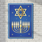 Hanukkah Poster on White Brick Wall