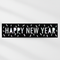 Happy New Year banner against a white wall