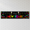 Happy New Year banner on a white brick wall