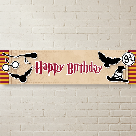 Harry Potter Happy Birthday Banner on Off-White Brick Wall