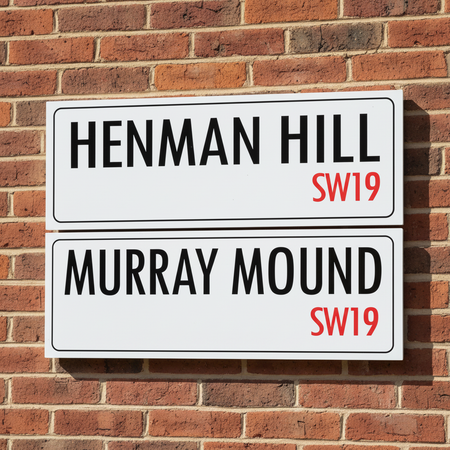 Henman Hill Murray Mound Street Signs on Red Brick Wall
