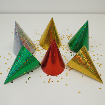 Holographic Party Hats on Table with Gold Confetti