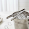 Ice Tongs in Ice Bucket Close Up