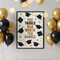 The Tassle Was Worth The Hassle graduation poster displayed in a party setting with gold and black balloons