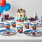 Marvel Avengers paper cups styled on a superhero birthday party table with matching tableware