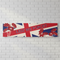 Lest We Forget Paper Banner on White Brick Wall