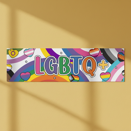 LGBTQ+ Banner on Warm Yellow Wall