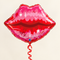 Lips balloon floating with red curling ribbon against a neutral background with soft light and shade, in square format