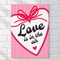 Love is in the air poster close up on a white brick wall with soft light and shade, in square format