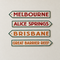 Melbourne, Alice Springs, Brisbane and Great Barrier Reef cut-outs on an off-white wall