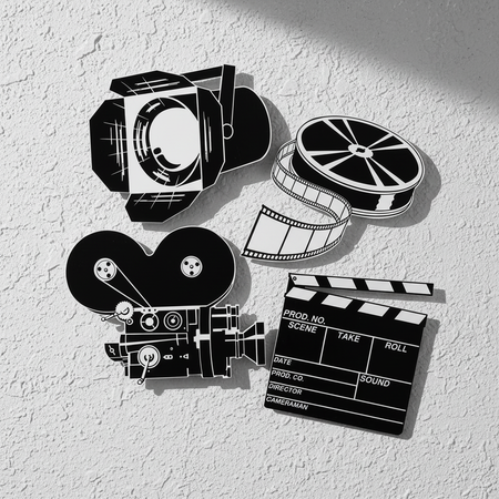 Movie Film Set Cutouts on White Textured Wall