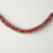 Multicolour Tissue Festooning Hung Against Wall