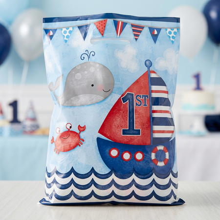Nautical first birthday party bag standing upright with concealed contents in a close-up square party setting