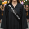 One Degree Hotter Sash on Female Graduate