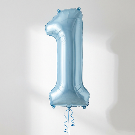 Pale blue number 1 balloon floating with blue curling ribbon against a white wall with soft light and shade, in a close-up square composition