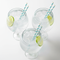 Pale Blue Striped Straws in Gin Goblets Overhead