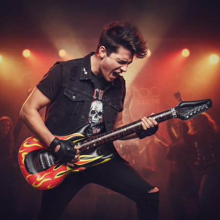 Person Air Guitaring with Inflatable Flame Guitar Rock Party