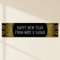 Personalised Happy New Year banner against a cream wall