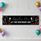Personalised New Year banner on a white brick wall