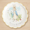 Peter Rabbit plate on a light wood background, keeping the same perspective and square format