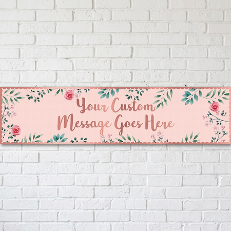 Pink floral banner on a white brick wall with soft light and shade, in square format