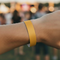 Plain Gold Festival Wristband on Wrist Close Up