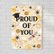 Proud Of You Poster on White Brick Wall