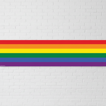 Rainbow Banner on White Brick Wall