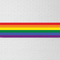 Rainbow Banner on White Brick Wall