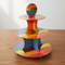 Rainbow Cake Stand on Wood Table