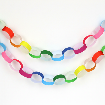 Rainbow Paper Chains on Bright White Wall