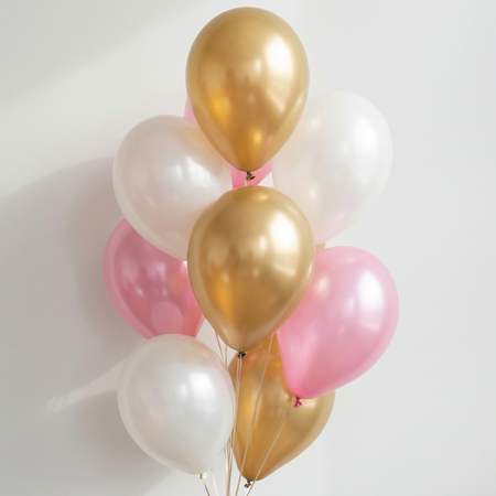 Realistic pink, gold and pearl white balloon bunch against a white wall with soft light and shade, in square format
