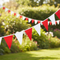 Red and White Bunting in Garden Setting
