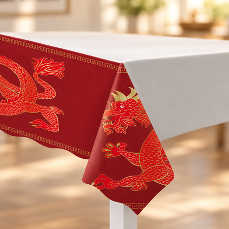 Red Chinese dragon table cover on a white table with a warm blurred background, square format