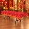 Red Chinese New Year table cover on a folding table with a subtly festive blurred background, square format