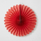Red Paper Fan on White Textured Wall