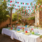 Red White Green Bunting Over Party Tables