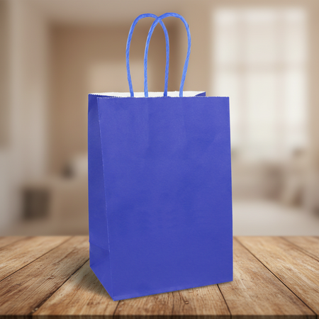 Royal Blue Party Bag on Wood Table