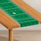 Rugby pitch table runner in the same close-up position with a neutral background and floor, in square format
