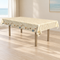 Shell-patterned table in a beach-inspired setting