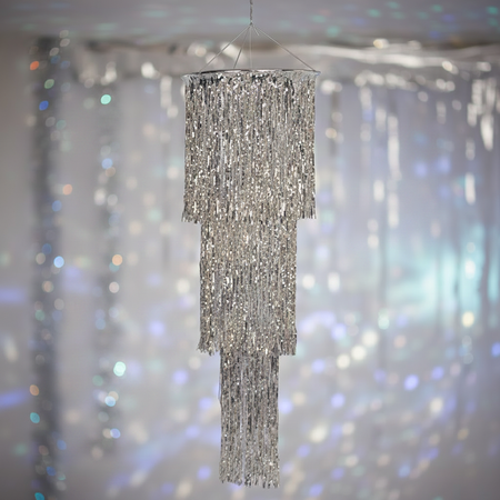 Silver chandelier with a disco-ball-free party background