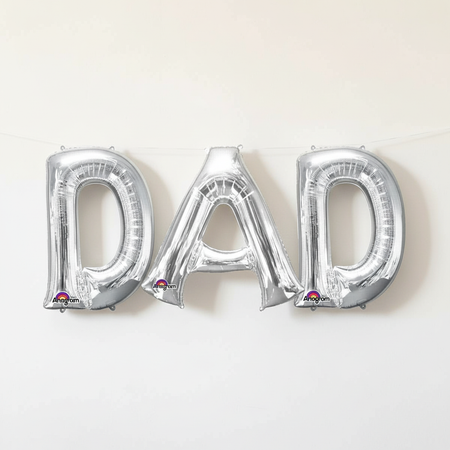 Silver DAD Foil Balloons on Wall