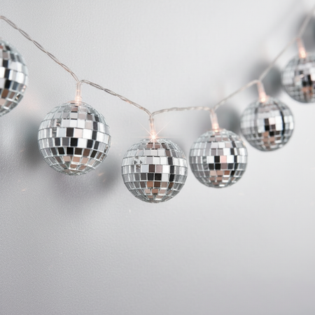 Silver Disco Ball Lights Extreme Close Up Plain Silver Background