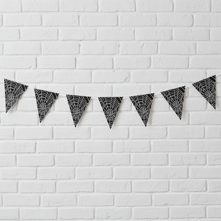 Spiderweb Bunting White Brick Wall